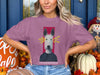 Mauve t-shirt with a distressed dog graphic and the word "overstimulated".