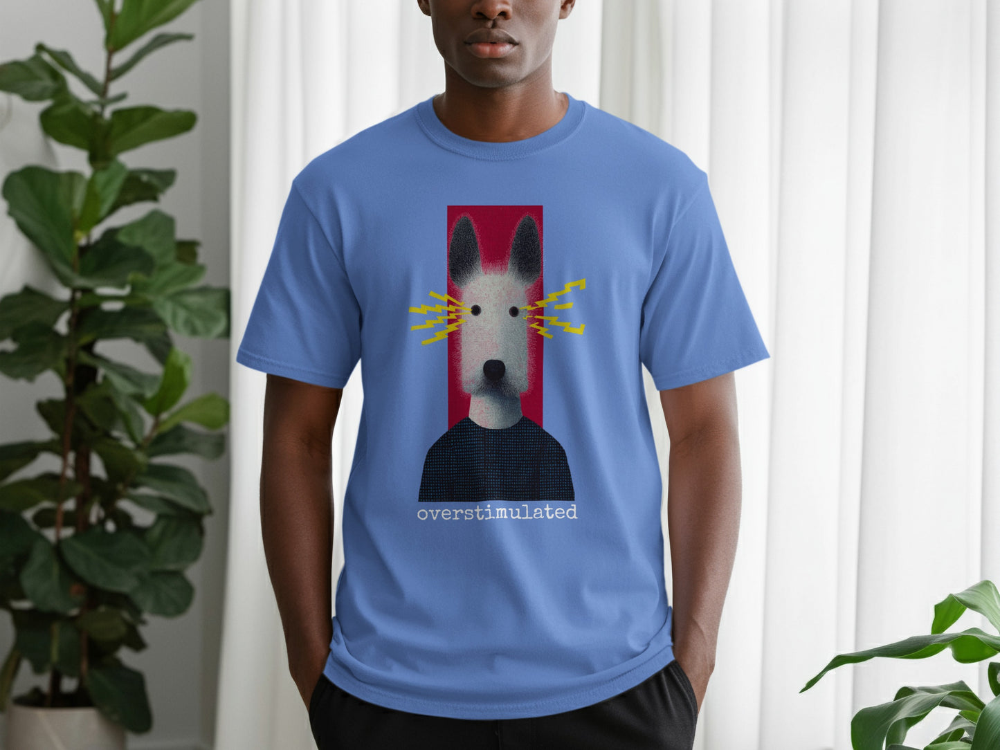 Blue t-shirt with graphic of a stylized dog head and the word "overstimulated".