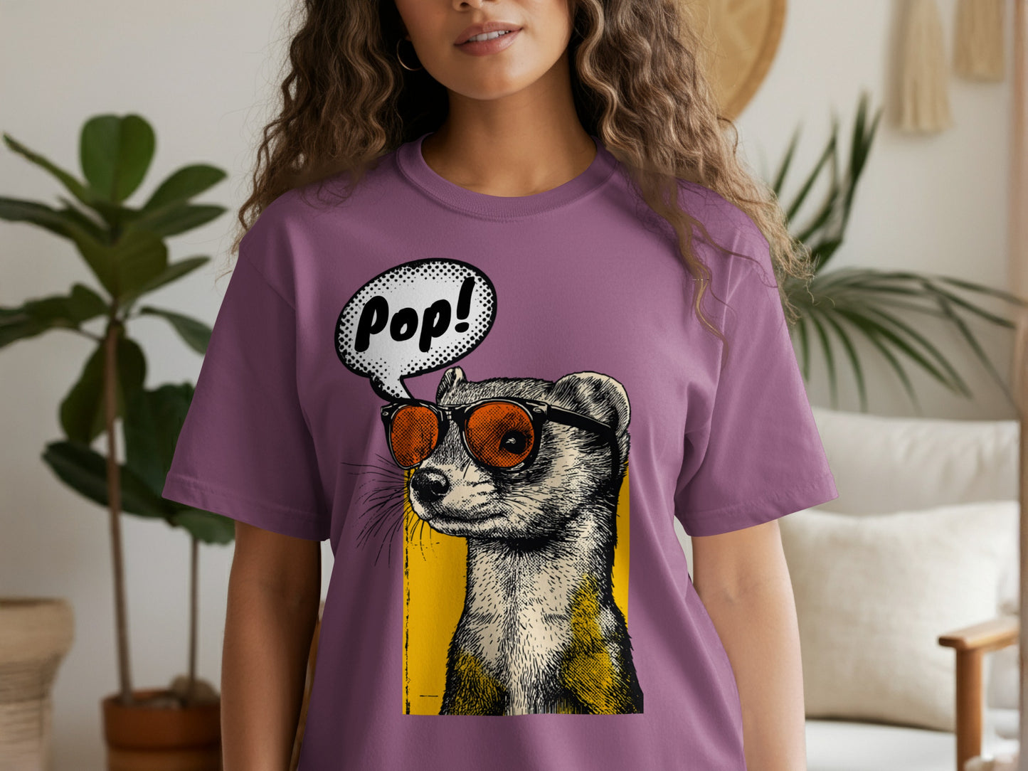 Purple t-shirt with a stylized ferret wearing sunglasses and the word "Pop!".