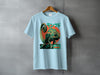 Light blue t-shirt with a stylized green chameleon and Japanese text.