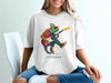 Chameleon in sunglasses plays a guitar on a white t-shirt.