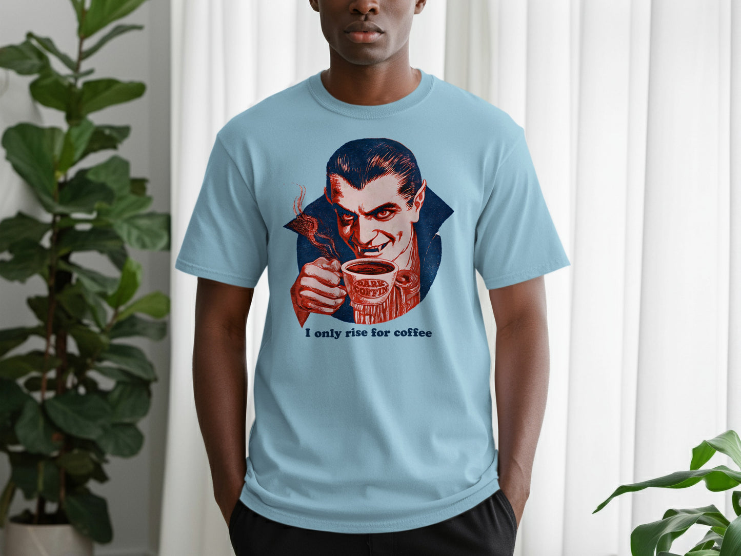 Dracula character holding coffee cup, "I only rise for coffee" text.