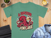 Red octopus eating a slice of cake, text "A Sucker For Cake"