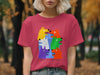 Pink t-shirt with colorful cartoon dogs and "DO NOT LET THEM DRIVE" text.