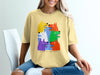 Yellow t-shirt with abstract dog faces and text "DO NOT LET THEM DRIVE".