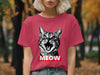 Black and white cat face with open mouth and "MEOW" text on a red t-shirt.
