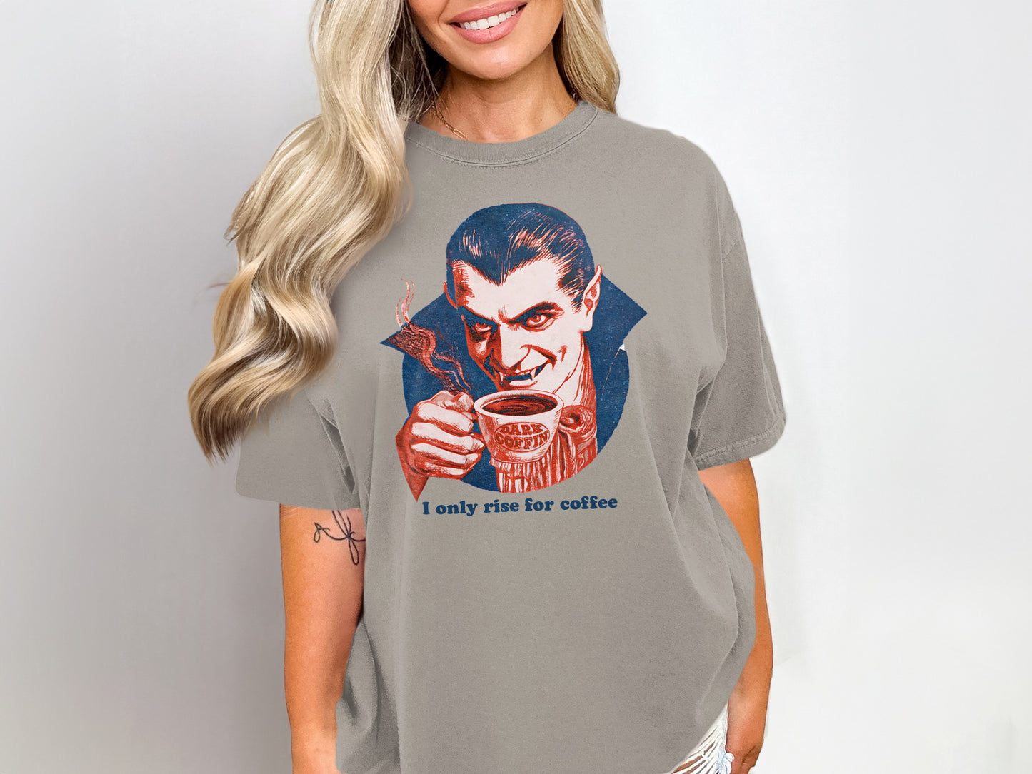 Vampire with coffee mug, "I only rise for coffee" text.