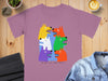 Purple t-shirt with a colorful graphic of six stylized dogs and text that reads "DO NOT LET THEM DRIVE".